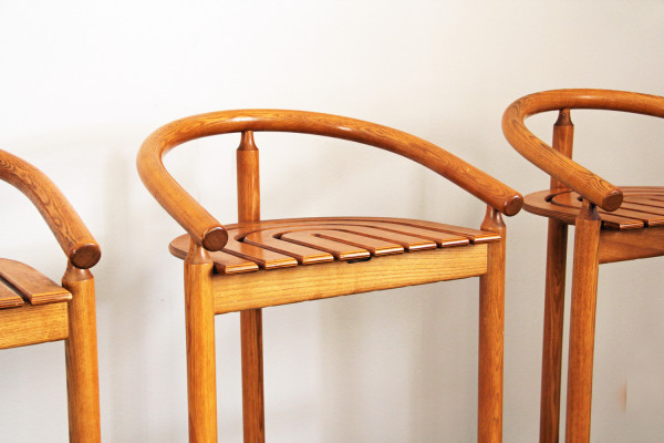 Organically shaped oak bar stools from Allmilmö