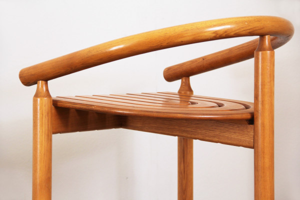 Organically shaped oak bar stools from Allmilmö