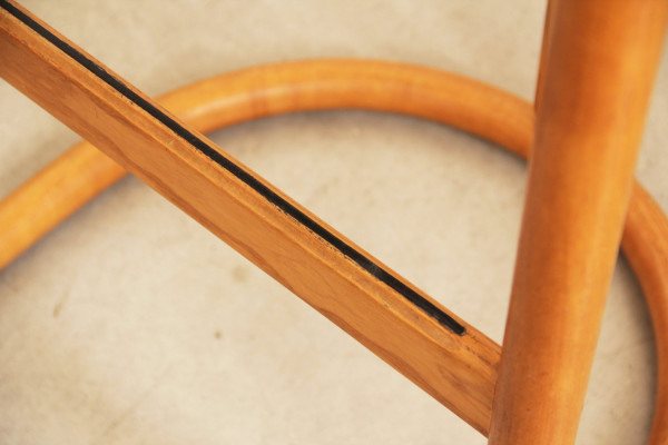 Organically shaped oak bar stools from Allmilmö